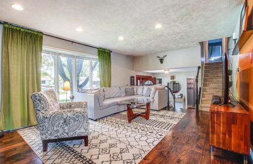 Oshkosh Casa | Oshkosh Canal-Front Home with Sunroom and Watercraft!