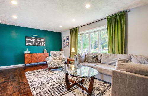 Oshkosh Casa | Oshkosh Canal-Front Home with Sunroom and Watercraft!