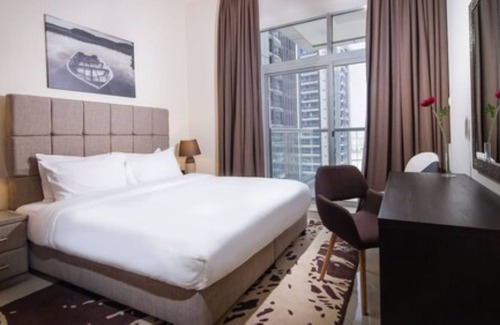 Dubai Sports City Apartamento | OSKENA Vacation Homes - The Medalist Tower Sport city