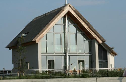 Heiligenhafen Casa | Ostsee - Reetdachhaus Nr 46 "Strandrausch" im Strand Resort