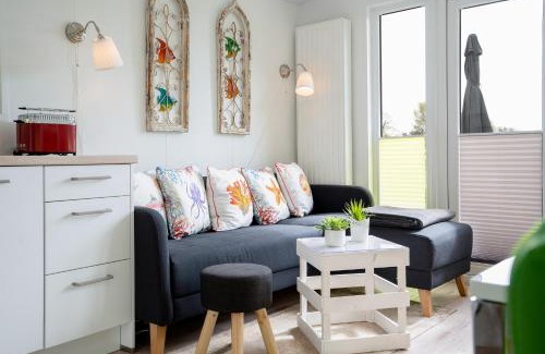 Gronenberg Casa | Ostseecamp Lübecker Bucht Ferienhaus "Fisch Ole"