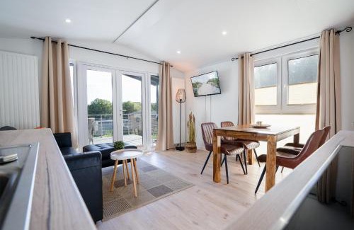 Gronenberg Casa | Ostseecamp Lübecker Bucht Haus "Morgensonne" mit überdachter Veranda