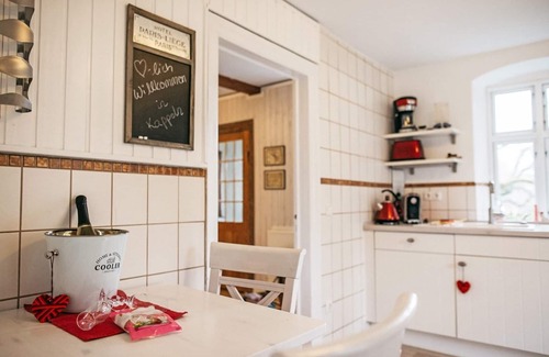 Kappeln Apartamento | Apartamento en un edificio histórico con sauna, chimenea y WiFi.