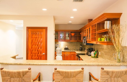 Lawson Rock Condominio | Out our door onto the sand and into the water, luxury condo and Large Patio in Lawson