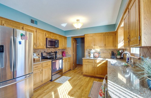 Overland Park Casa | Overland Park Family Home w/ Game Room & Backyard!