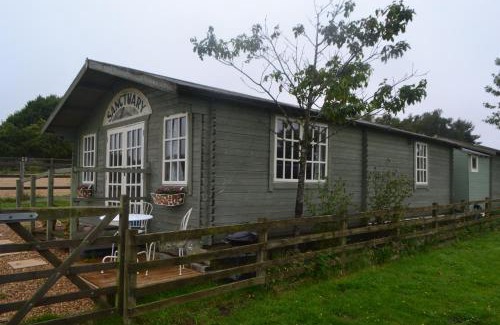 Woodhorn Casa | Owls Nest Log Cabin