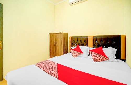 Depok Hotel | OYO 94716 Hartini Residence Syariah