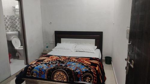 Sardhana Hotel | OYO Metro Oasis Hotel