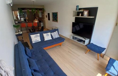 Embare Apartamento | Pé na Areia em Santos: Sol, Mar e Netflix