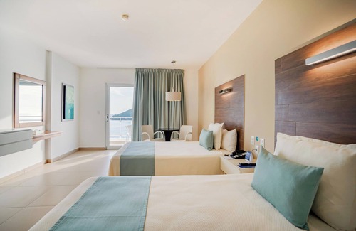Zona Dorada Hotel | Pacific Palace Beach Tower Hotel