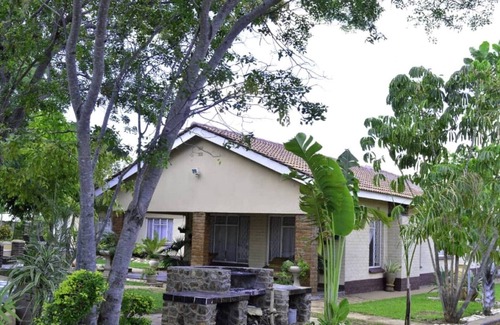 Kwekwe Casa | Palm & Rose Garden, Golden Acres