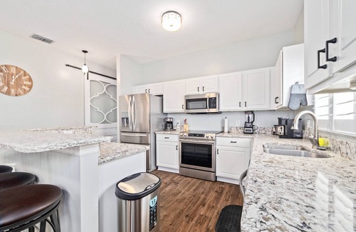Palm Harbor Casa | Palm Harbor Retreat! Heated Pool, Game Room, Bikes, Kayaks & Near Beaches – Perfect Family Getaways!