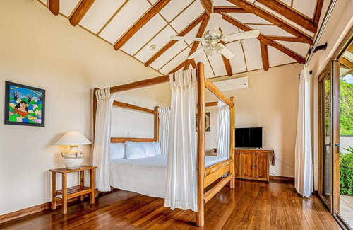 Islita Otro | Palm-lined oasis with mountain & ocean views, a pool, hammock, & soaking tubs