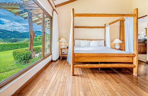 Islita Otro | Palm-lined oasis with mountain & ocean views, a pool, hammock, & soaking tubs