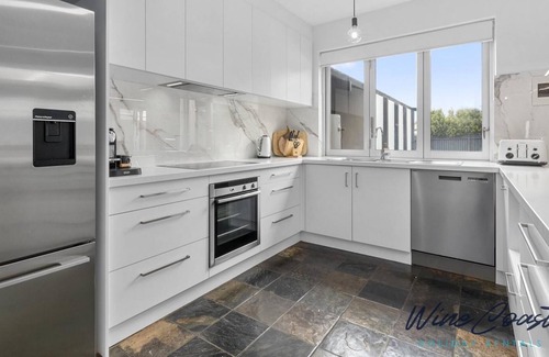 Sellicks Beach Casa | Palms on The Esplanade by Wine Coast Holidays - This well-appointed seafront home offers everything a family (or two ) could conceivably want for your next coastal getaway.