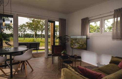 Municipality of Rijssen-Holten Chalet De Esquí | Panorama lodge with wellness and hottub | 2 p.