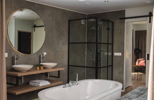 Municipality of Rijssen-Holten Chalet De Esquí | Panorama lodge with wellness and hottub | 2 p.