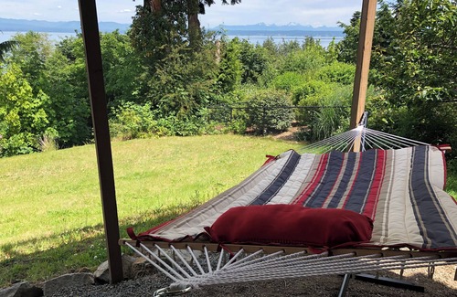 Camano Island Casa | Panoramic View House of Puget Sound with hot tub and walls of windows