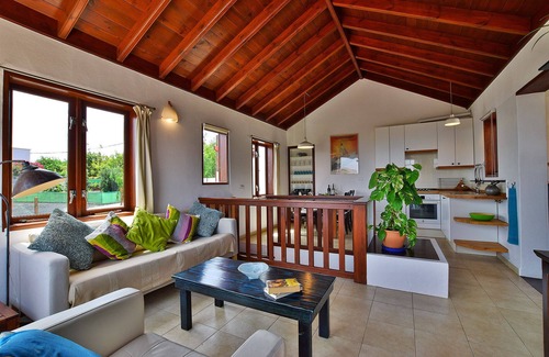 Tabayesco Villa | Vista panorámica sobre la bahía de Arrieta, jardín privado, a 1 km de la playa.