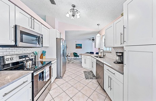 Port Saint Lucie Casa | Paradise! 3 Bedroom home with private pool, outdoor living space, and lanai