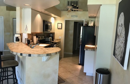 Naples Condominio | ¡Paraíso hablado en el prestigioso Eagle Creek Golf and Country Club!