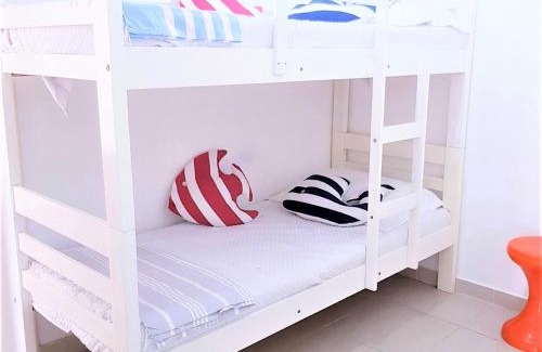 Jardim Centenario Apartamento | Paraiso no Guarujá Enseada - Piscina - Ar Condicionado - WIFI - Garagem