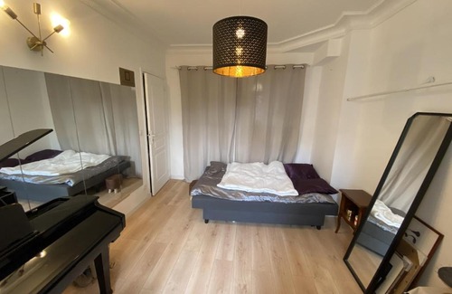 Quartier des peupliers Apartamento | Paris: agréable chambre d’un grand créateur