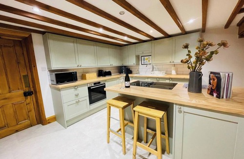 Hulme End Casa | Pass the Keys | The Old Shop Cosy Cottage for 6 & Furry Friends