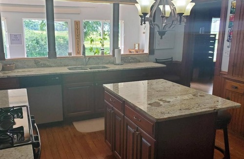 Cedar Falls Otro | Peaceful country farmhouse with wooded acreage