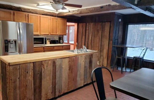 Delton Casa | Peaceful Lake House with pontoon boat rental on property.