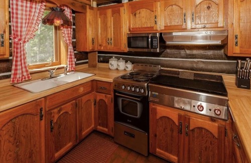 Spooner Cabina | Peaceful retreat on Yellow River. Kayak, canoe or explore our 20 wooded acres!