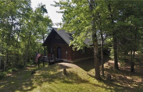 Spooner Cabina | Peaceful retreat on Yellow River. Kayak, canoe or explore our 20 wooded acres!