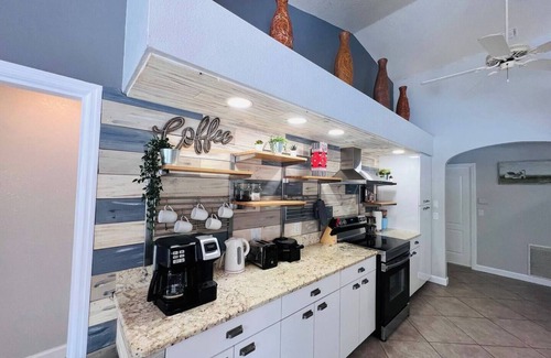 Laurel Casa | Peachland getaway with pool and tiki bar.