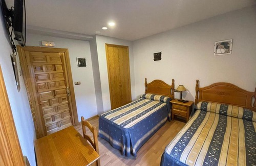 Olvega Casa | Pensión El Gallo