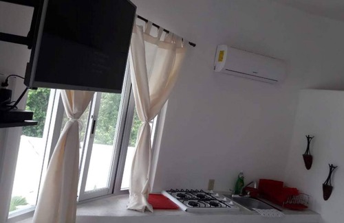 Chemuyil Apartamento | Ático en la jungla a 2 km de la playa.