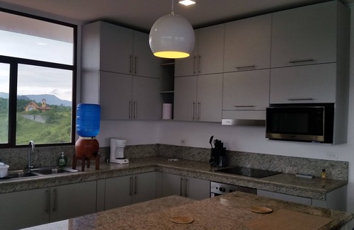 Comuna San José Condominio | Vista del ático desde la colina en Las Núñez