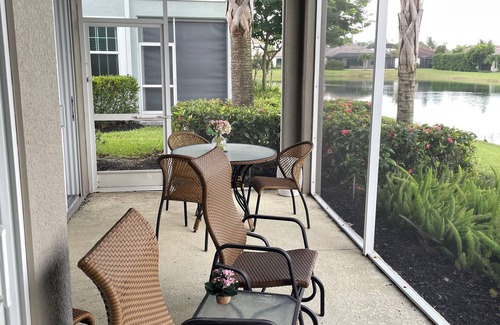 Rural Estates Condominio | Perfect 2-bedroom 1st floor condo, with scenic lake view in charming Naples Fl.