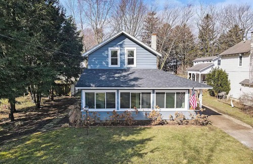 Macatawa Casa | Perfect Gathering Spot with a Fire Pit, Adirondack Chairs, Hammocks & Kayaks, Near Lake and Beaches