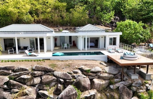 Anse Marcel Villa | Nueva villa privada moderna con vistas al océano y la playa de Anse Marcel