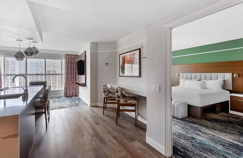 Las Vegas Hotel | Perfect Vegas Suite with Outdoor Pool Access for Relaxation | 2 Family Suites