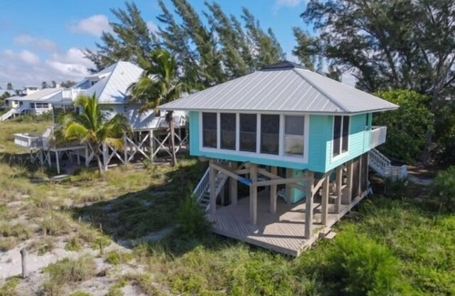 Palm Island Casa | Gulf Front 2BR / 2BA en comunidad cerrada con piscina y canchas de tenis! Four Seas, # 2112, Gulf Front Palm Island