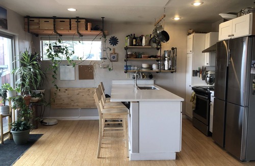 Ennis Casa | Pet friendly home with fenced yard, gardens and sauna one block from Main Street