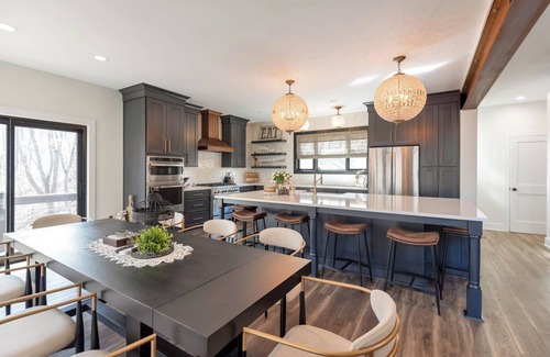 Lansing Casa | Luxury Riverfront Retreat - Game Room + Hot Tub + Lounge & Bar + Chef's Kitchen