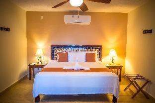 Villa Juarez Hotel | Petit Lafitte Beach Front Hotel & Bungalows