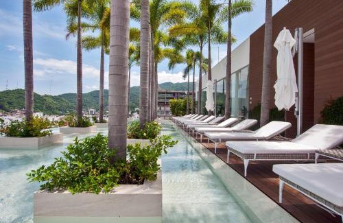 Zona romántica Apartamento | Pier 57 Modern Luxury PV's Best Rooftop!