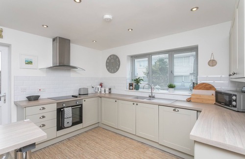 Rhoscolyn Casa | PINE CONES, with a garden in Four Mile Bridge