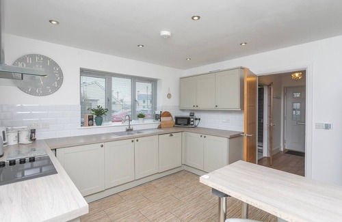 Rhoscolyn Casa | PINE CONES, with a garden in Four Mile Bridge