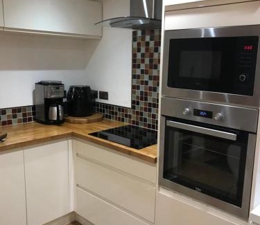 Upper Hulme Apartamento | Pine cottage with private hot tub