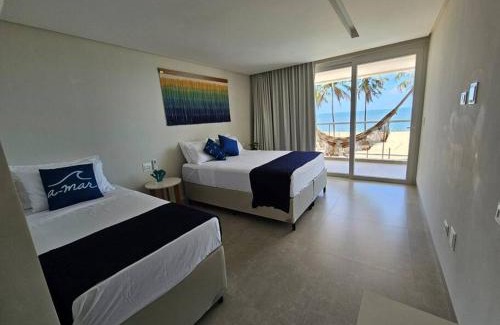 Barra do Sirinhaem Casa | Piscina aquecida, 5 suítes e pé na areia com vista espetacular!
