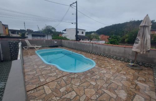 Pereque Casa | Piscina e mar